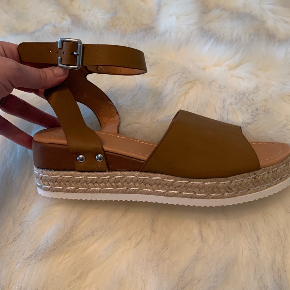 Brand new sandals.